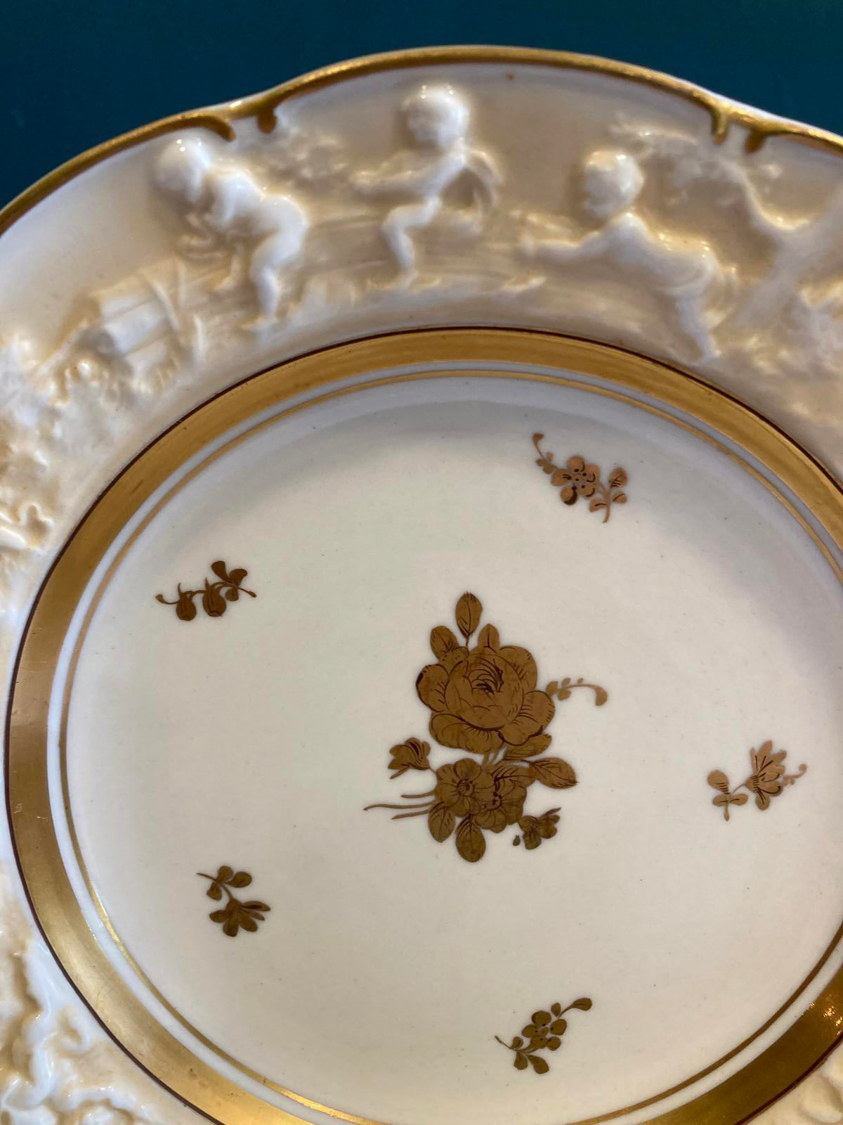 Set of 10 Ernst Bohne Söhne Embossed Cherub Plates with Gold Gilding
