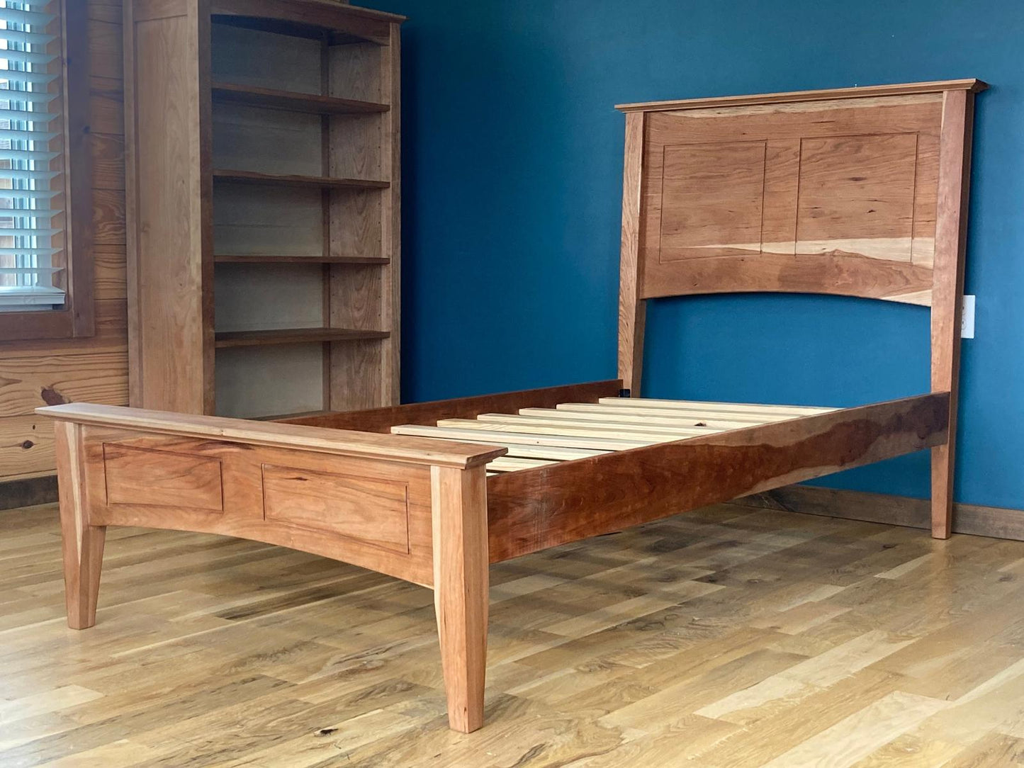 Side view of the bed frame with headboard and footboard
