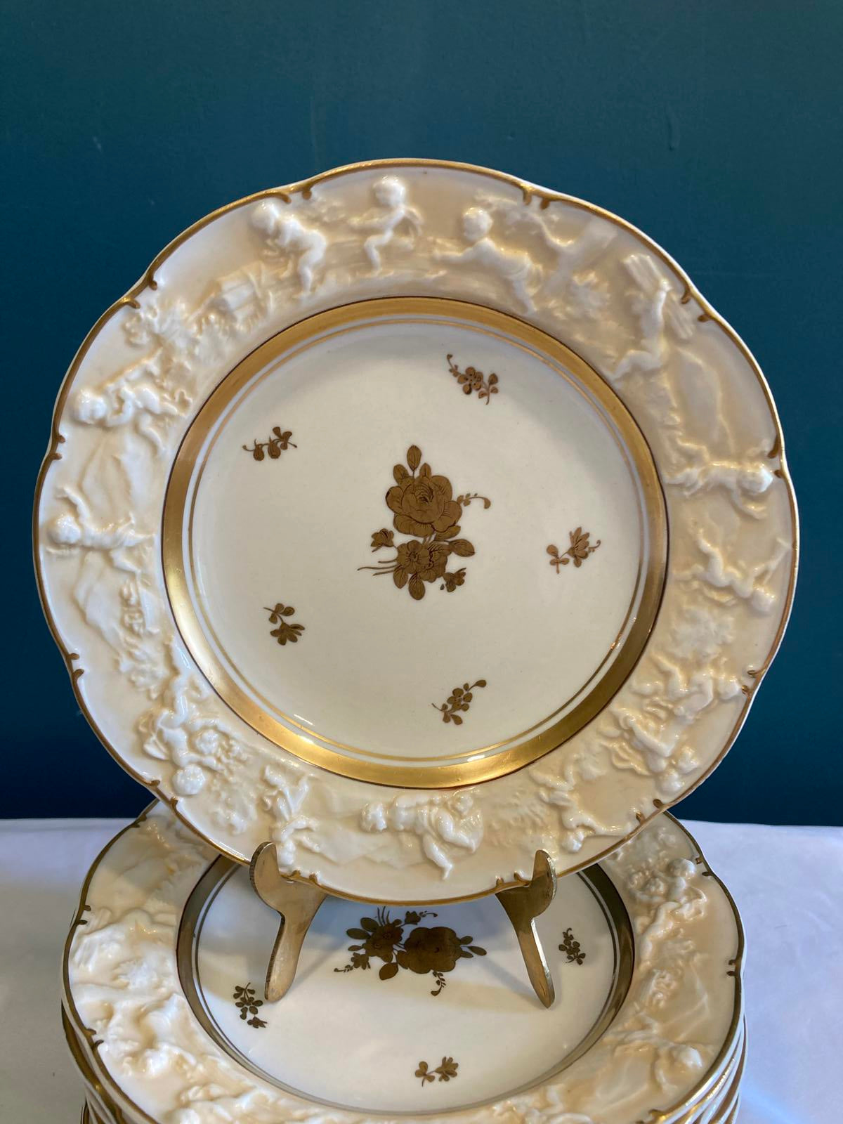 Set of 10 Ernst Bohne Söhne Embossed Cherub Plates with Gold Gilding