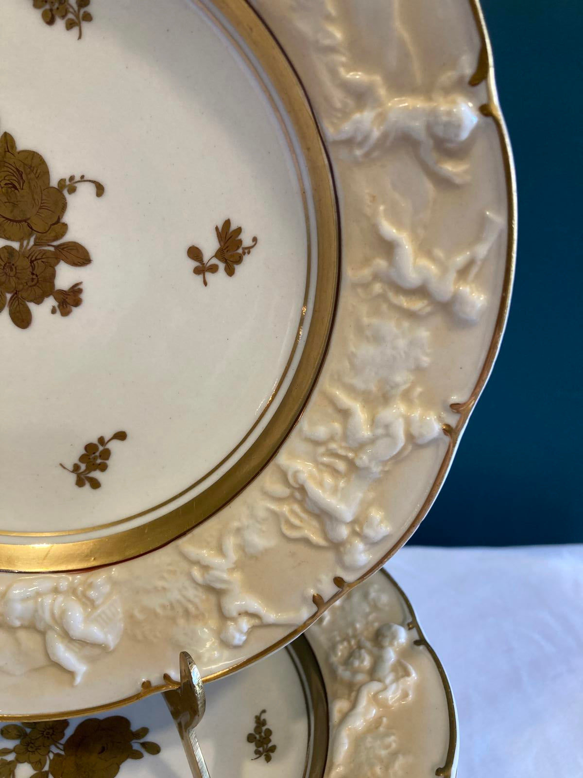 Set of 10 Ernst Bohne Söhne Embossed Cherub Plates with Gold Gilding