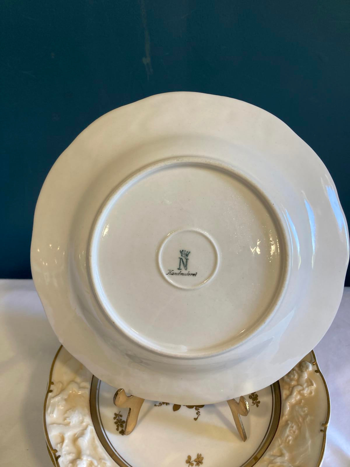 Set of 10 Ernst Bohne Söhne Embossed Cherub Plates with Gold Gilding