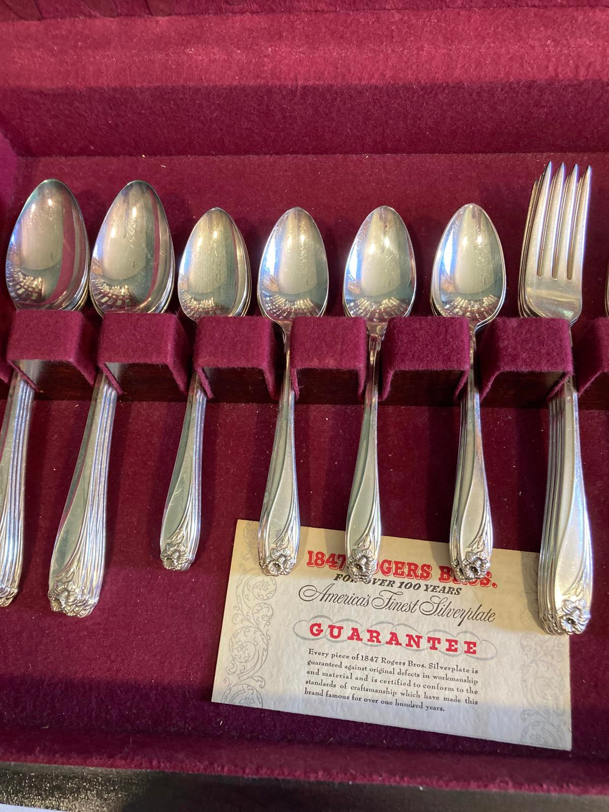 W.M. Rogers Daffodil Silverplate Flatware Set of 52 in Tarnish Free Wooden Case
