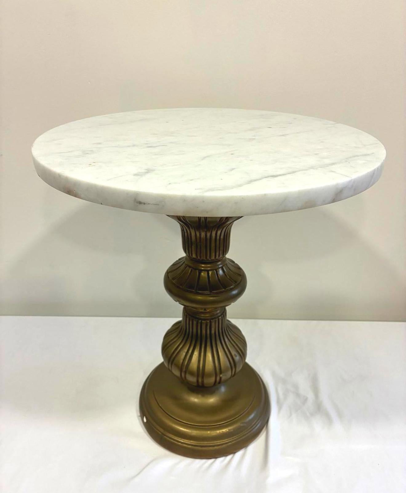 Vintage Italian marble top pedestal plant stand with gold painted plaster base and round white marble top.
