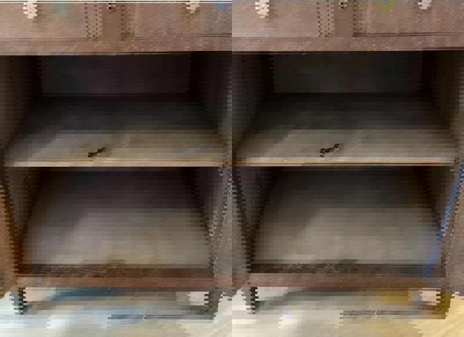 The inside of a wooden cabinet with two shelves. The shelves are empty and the cabinet is made of walnut