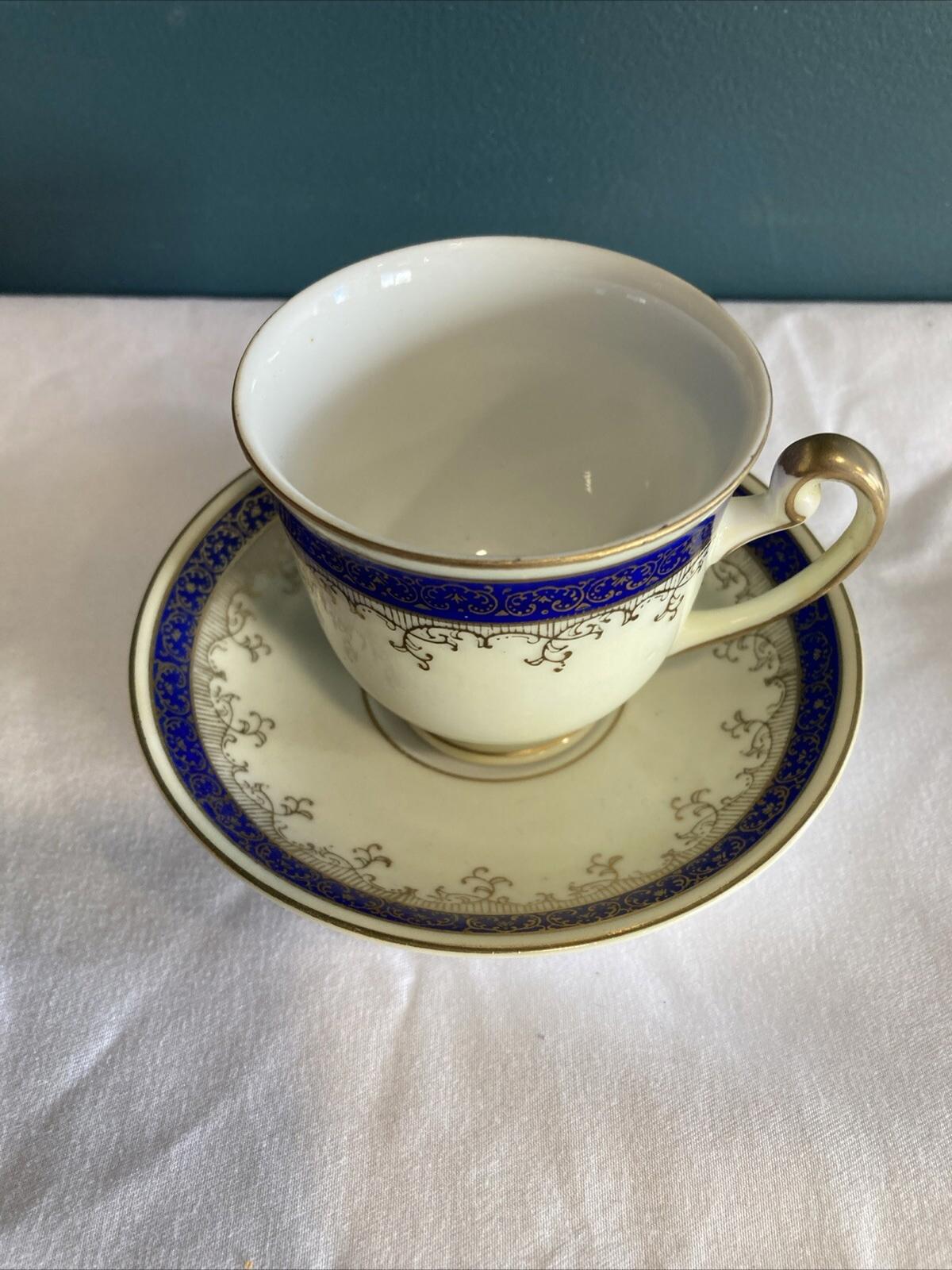 Regal China Demitasse Purple and Gold Tea Cup & Saucer