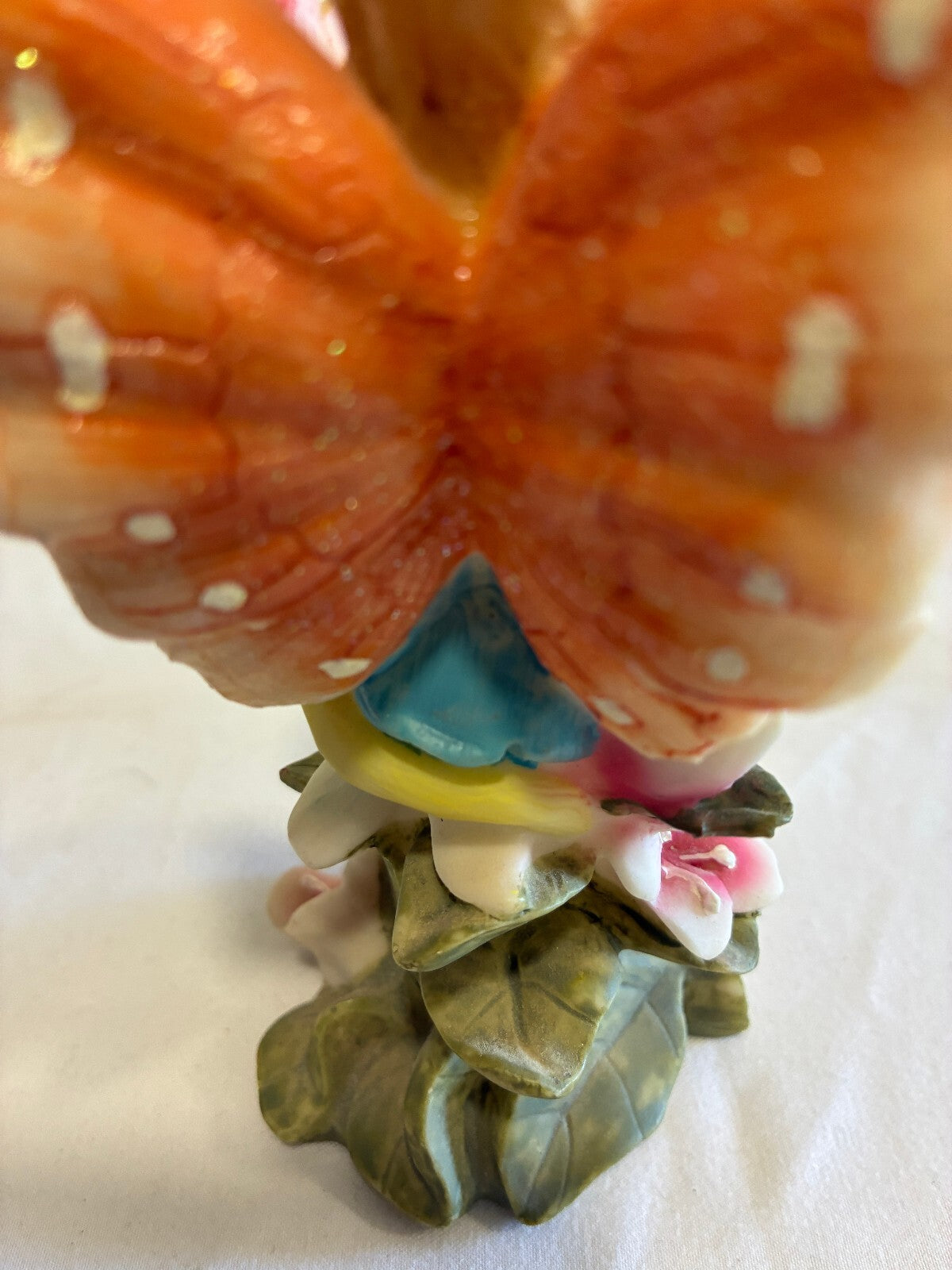 Vintage Fairy Figurine Holding Flower Pastel