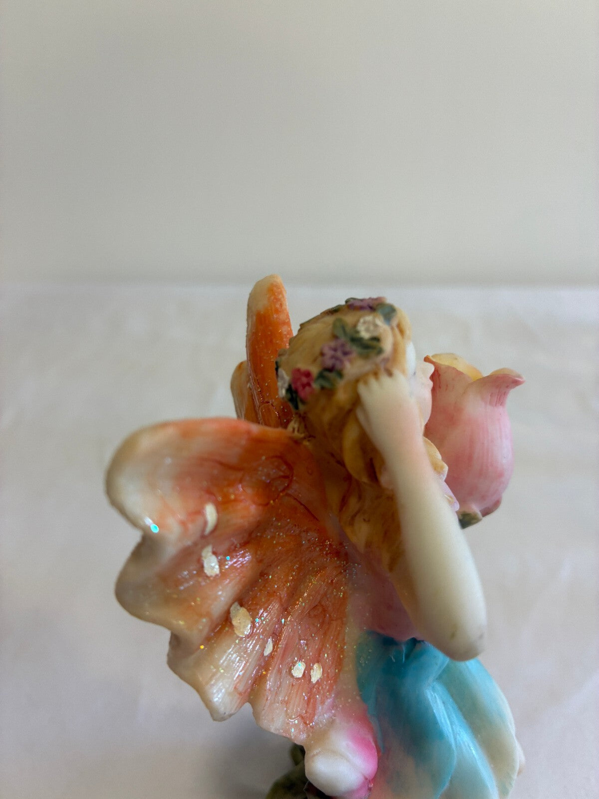 Vintage Fairy Figurine Holding Flower Pastel