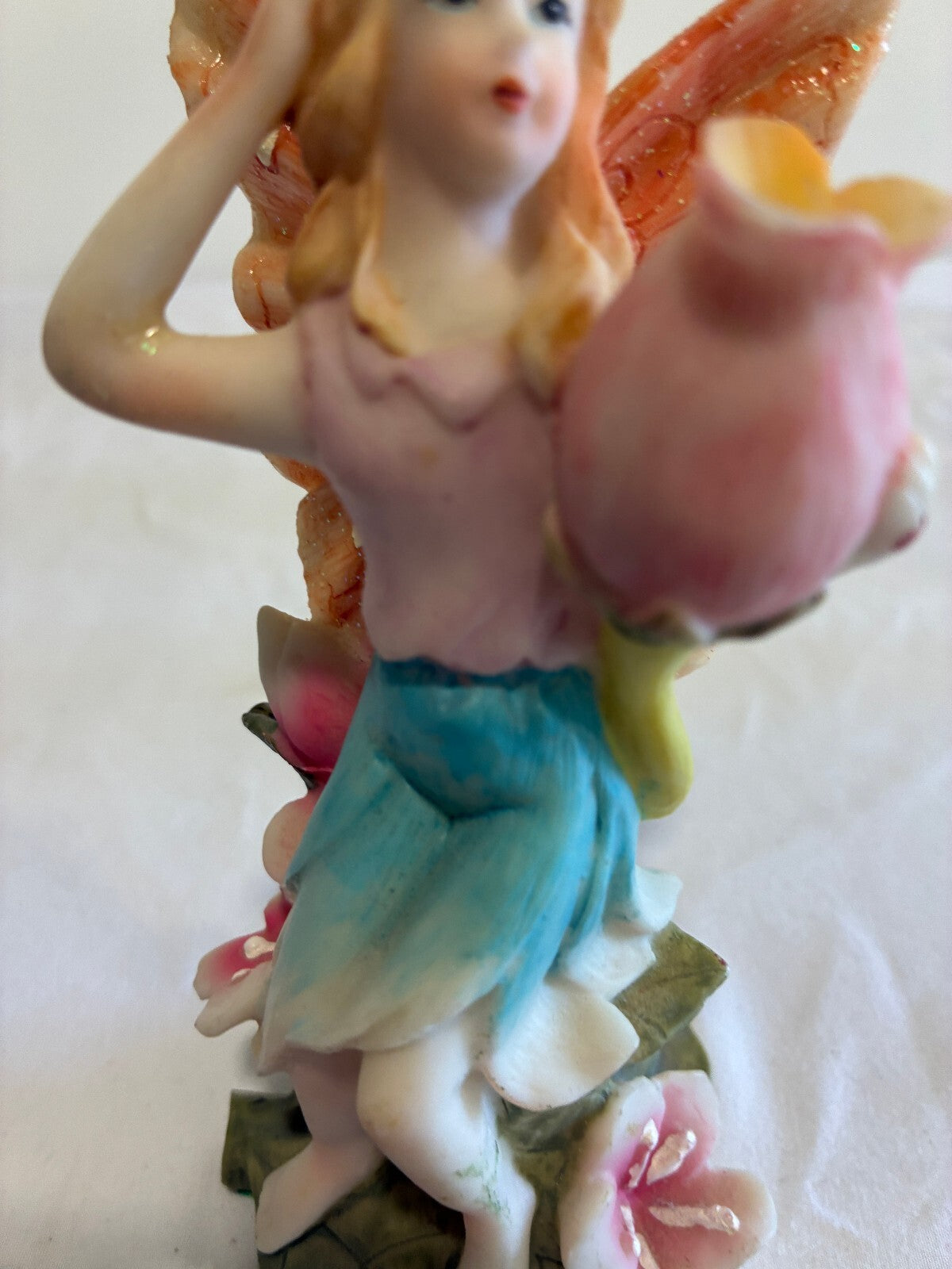 Vintage Fairy Figurine Holding Flower Pastel