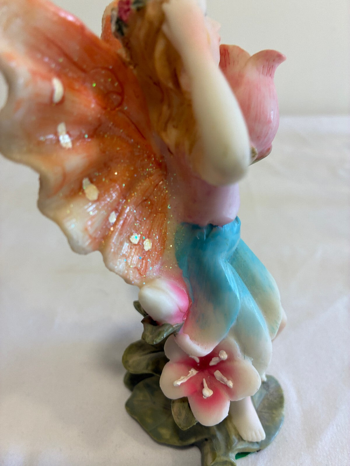 Vintage Fairy Figurine Holding Flower Pastel