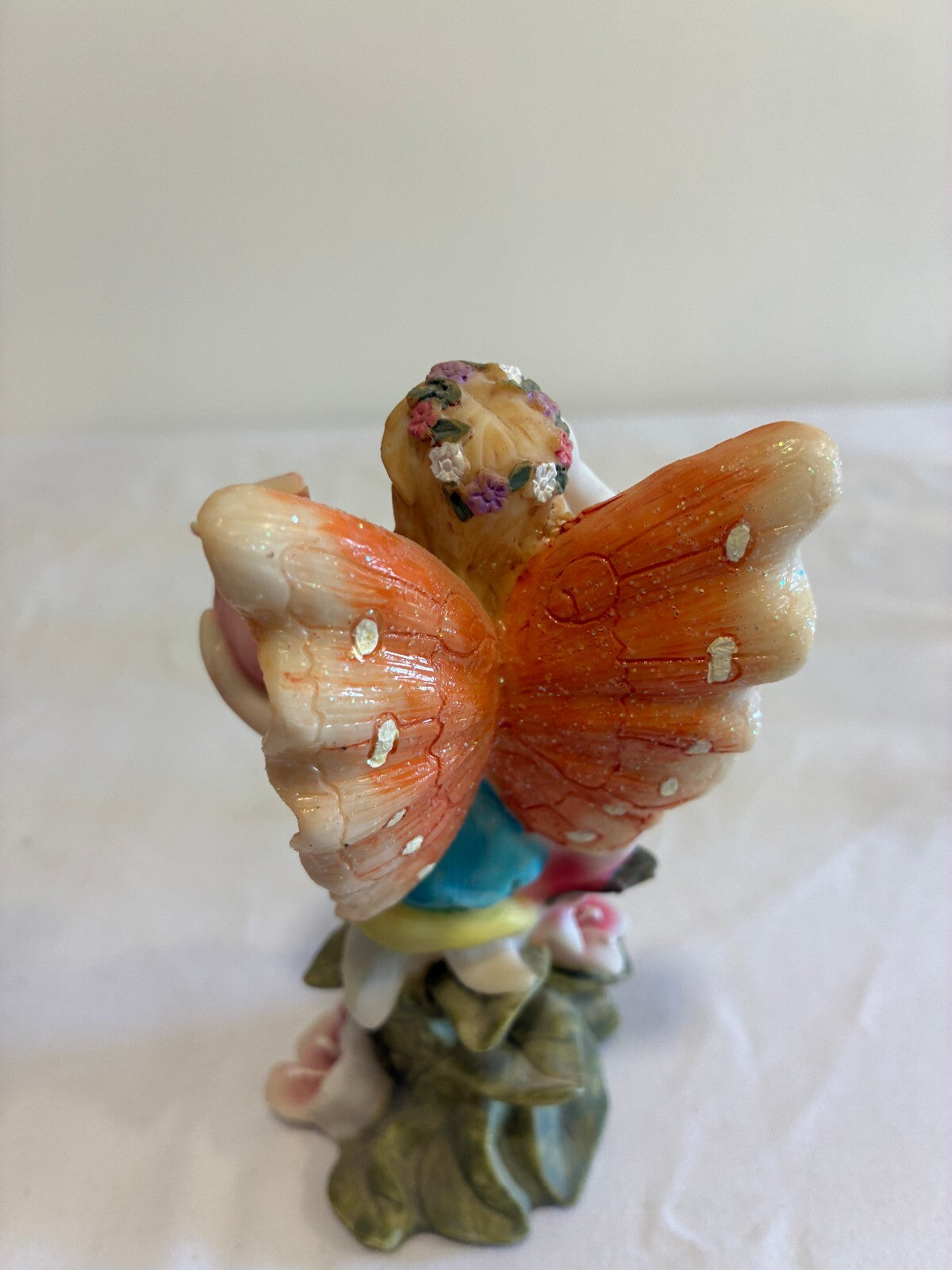 Vintage Fairy Figurine Holding Flower Pastel