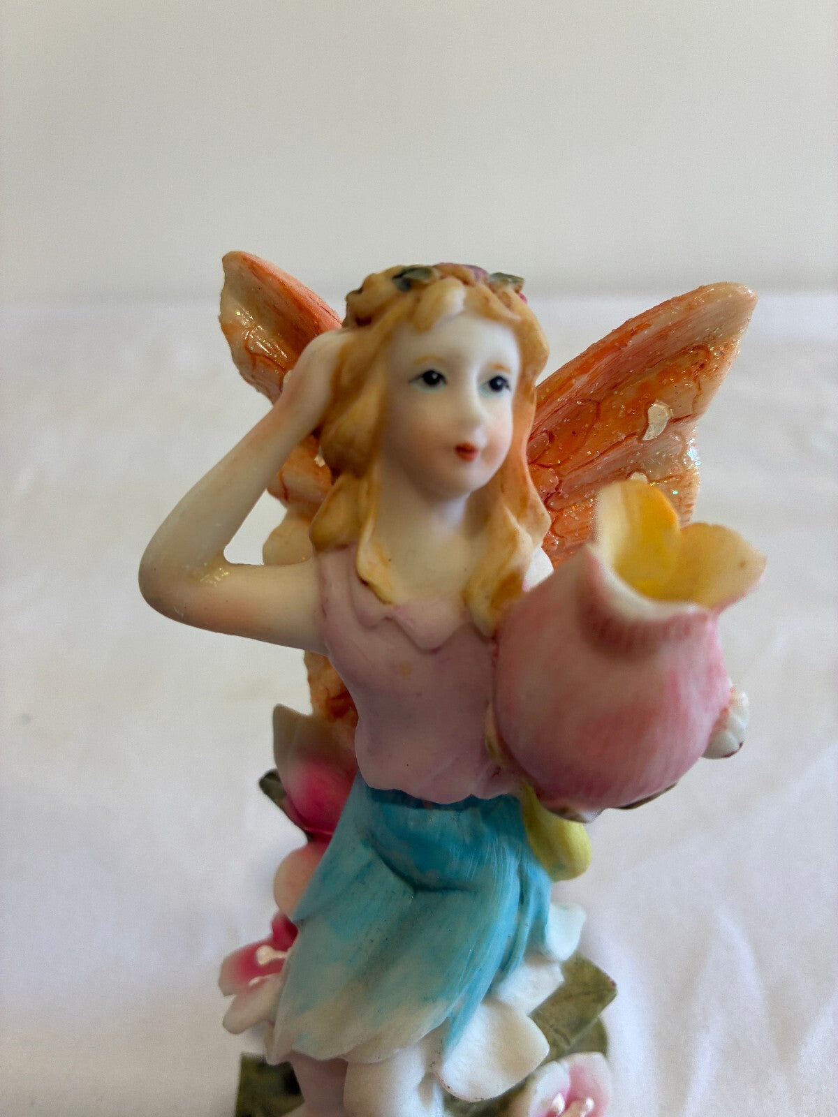 Vintage Fairy Figurine Holding Flower Pastel