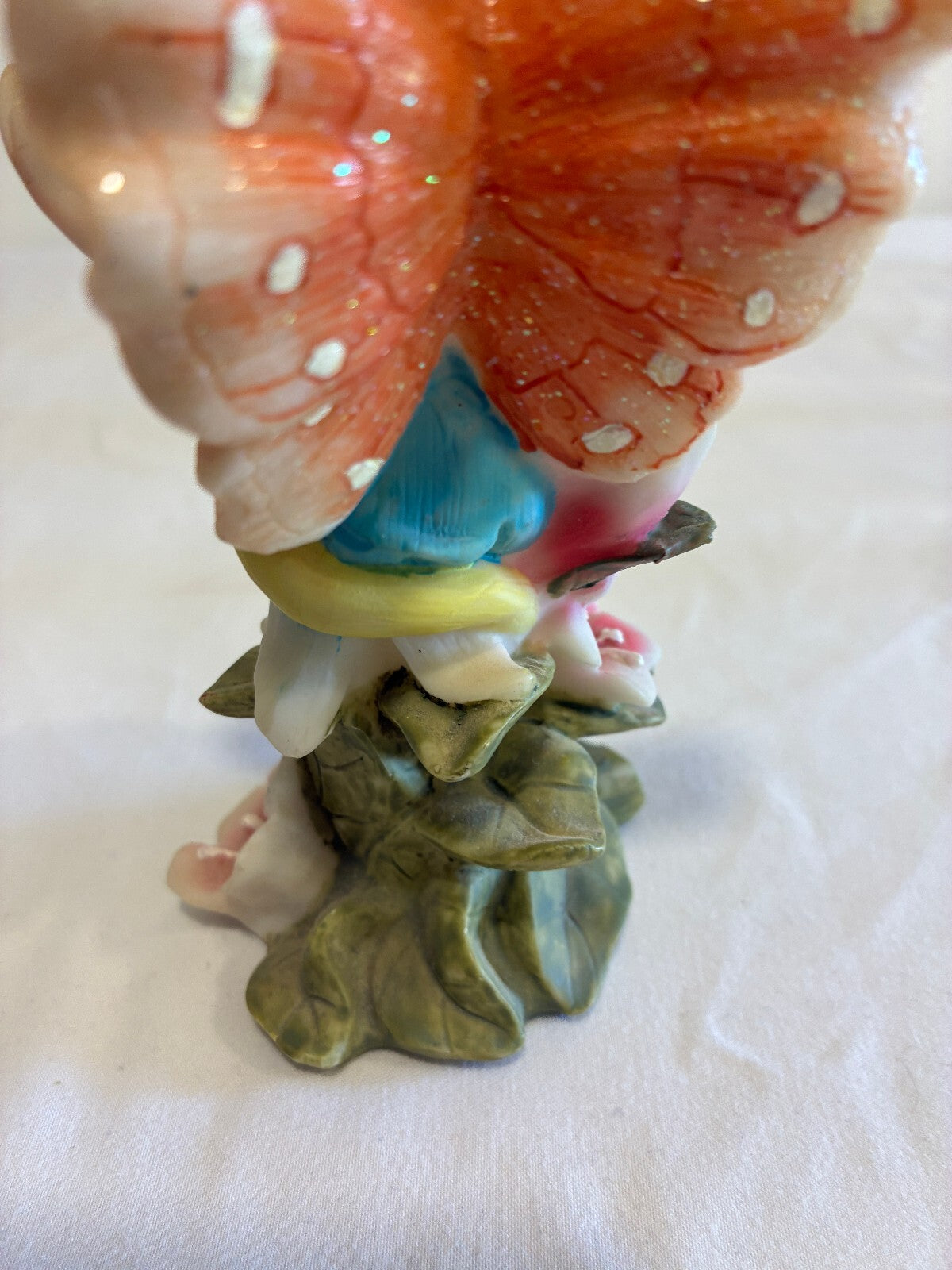 Vintage Fairy Figurine Holding Flower Pastel