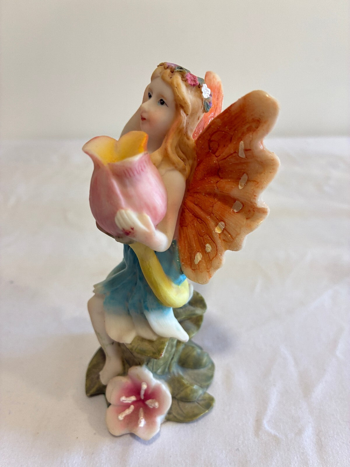 Vintage Fairy Figurine Holding Flower Pastel