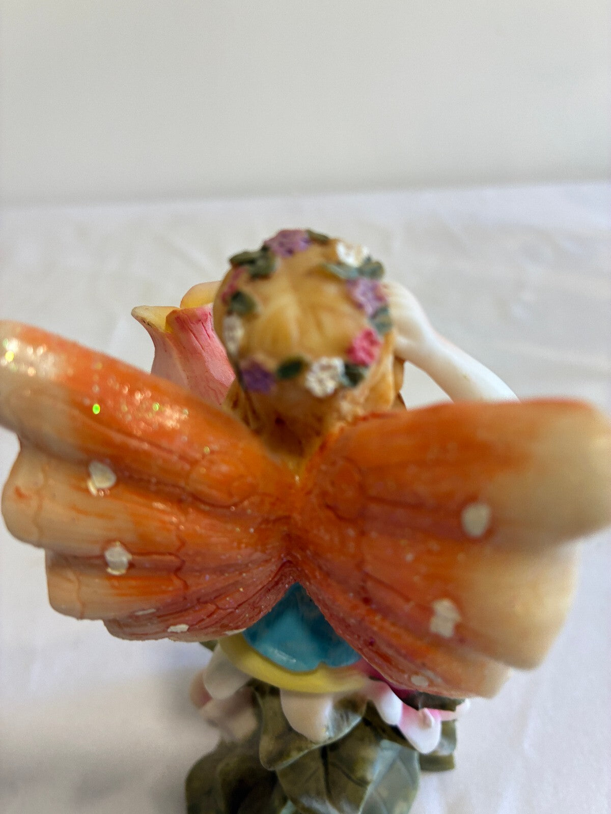 Vintage Fairy Figurine Holding Flower Pastel