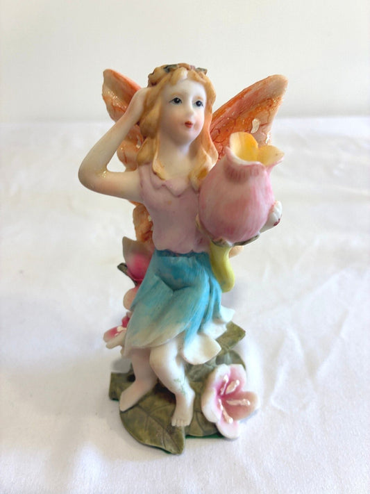 Vintage Fairy Figurine Holding Flower Pastel